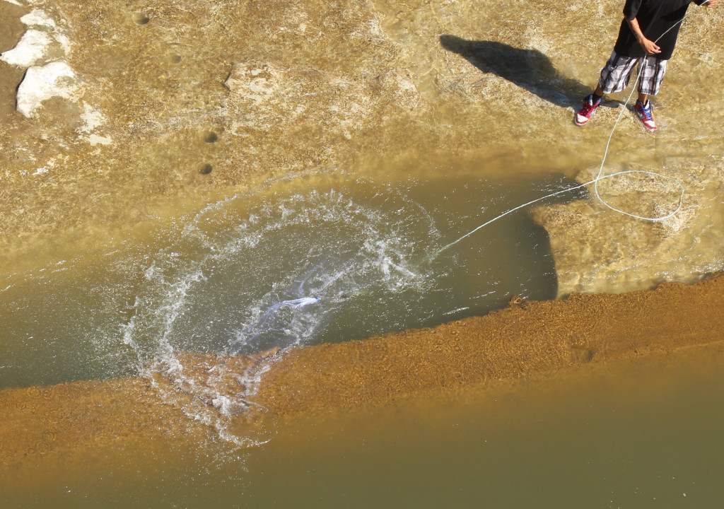 net hitting the water